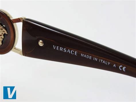 how to spot fake versace slides|versace piece serial number check.